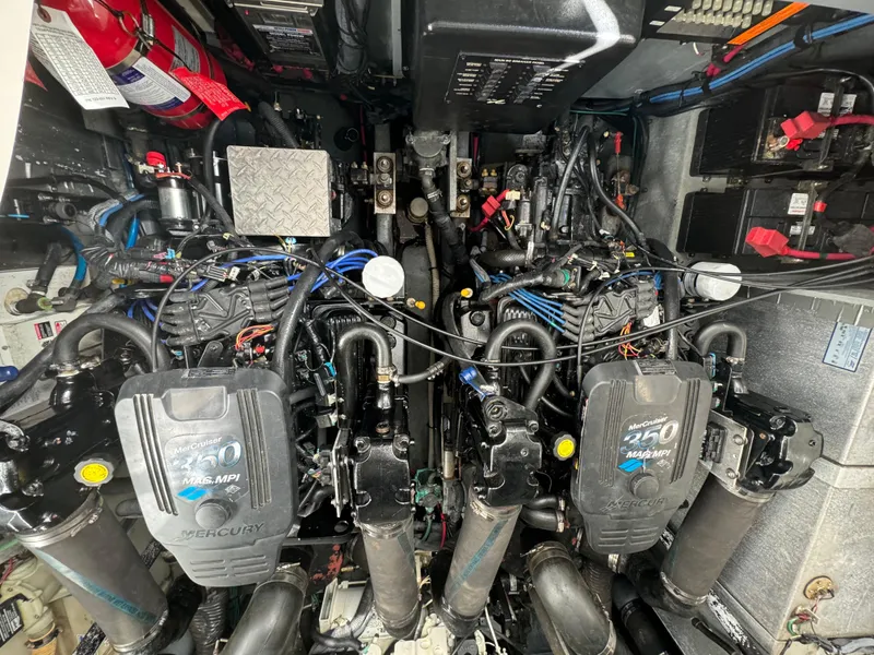 Slide: The Image of Engine room of 2004 Sea Ray 320 Sundancer with twin MerCruiser engines. - 20
