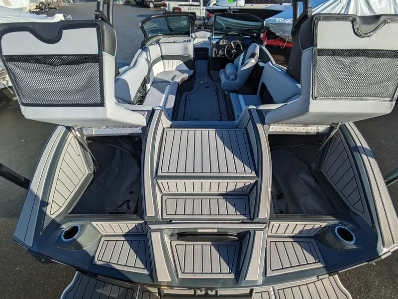 Slide: The Image of 2025 MB B52-21 Alpha boat interior with spacious seating and modern design. - 18