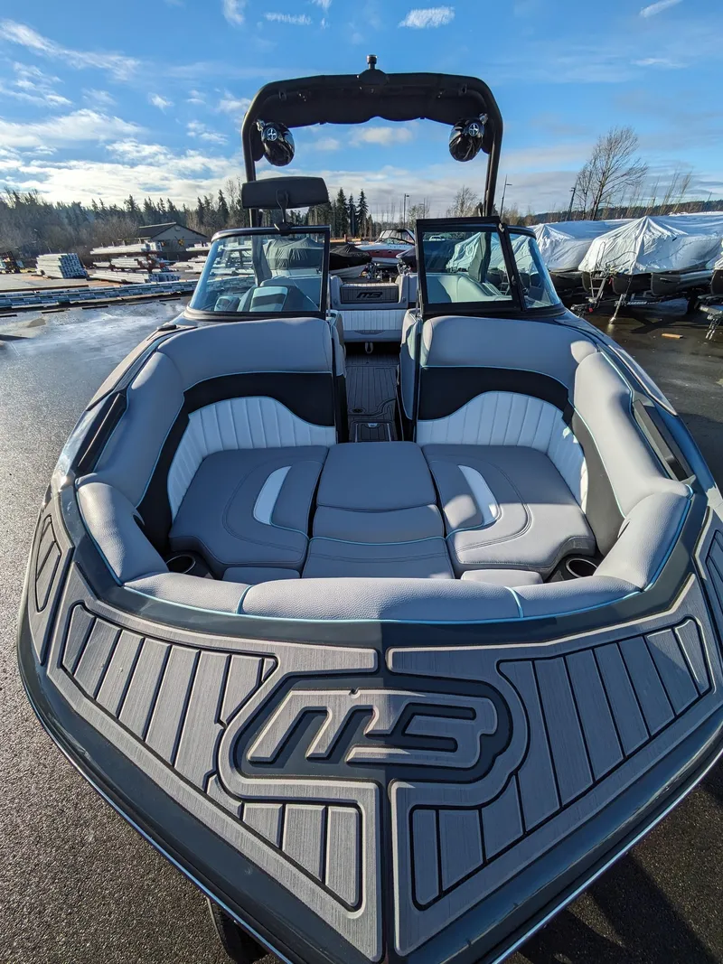 Slide: The Image of 2025 MB B52-21 Alpha boat with sleek design and spacious seating. - 3