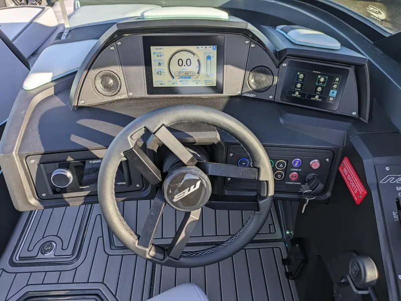 Slide: The Image of 2025 MB B52-21 Alpha dashboard with steering wheel and digital displays. - 5