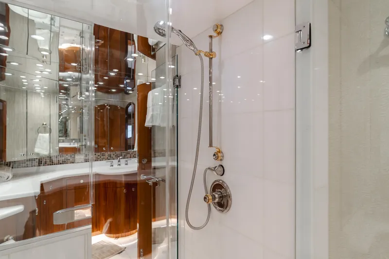 Slide: The Image of Luxurious bathroom in 2006 Hatteras 80 Motor Yacht with elegant shower design. - 24
