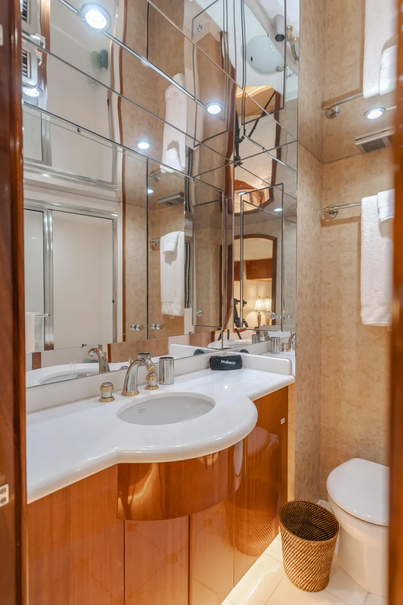 Slide: The Image of Luxurious bathroom in 2006 Hatteras 80 Motor Yacht with modern fixtures and elegant design. - 29