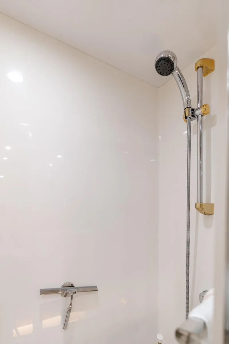 Slide: The Image of Shower area in 2006 Hatteras 80 Motor Yacht with modern fixtures. - 31