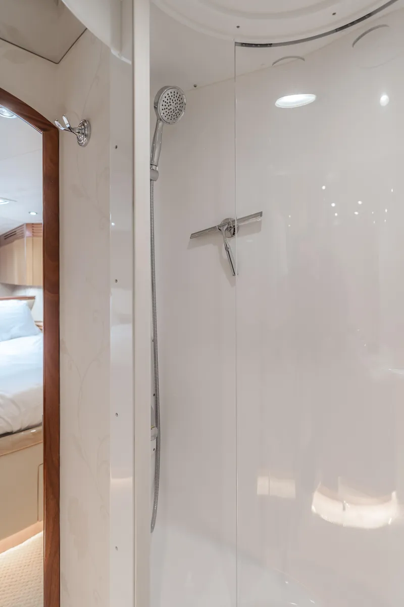 Slide: The Image of Shower area in 2006 Hatteras 80 Motor Yacht, featuring modern fixtures and sleek design. - 39