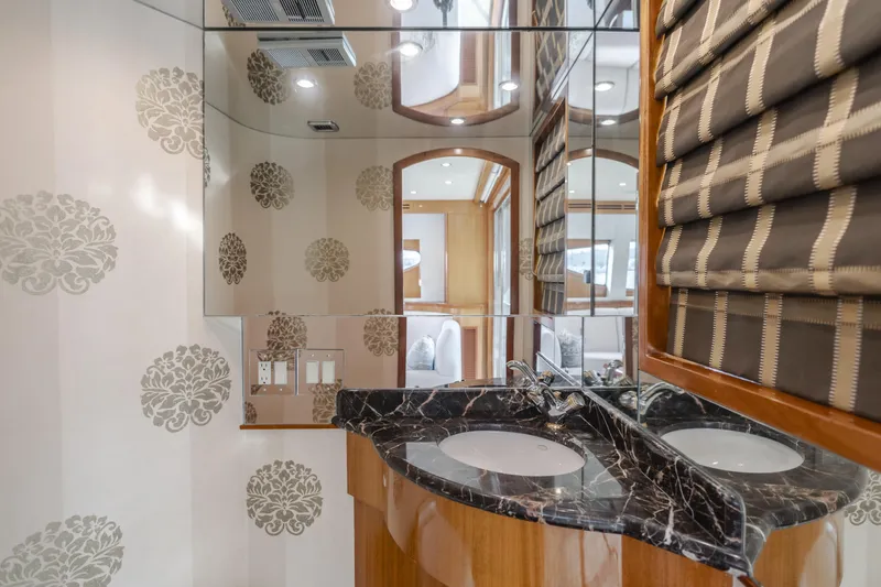 Slide: The Image of Luxurious bathroom in 2006 Hatteras 80 Motor Yacht with elegant decor and dual sinks. - 45