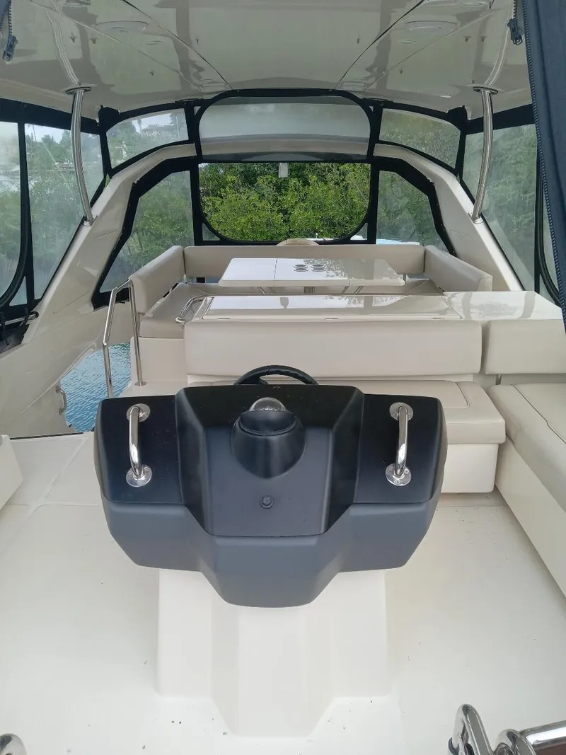 Slide: The Image of Interior of 2016 Aquila 44 yacht with modern helm and seating area. - 10