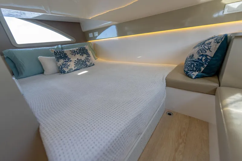 Slide: The Image of Luxurious cabin interior of 2025 Hanover 347 Outboard with cozy bedding and modern design. - 14