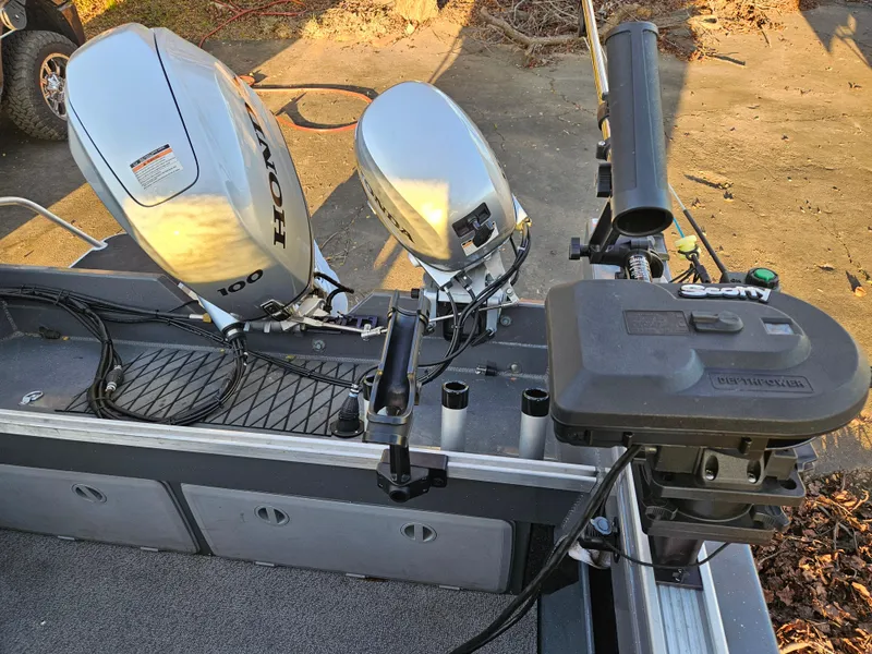 Slide: The Image of 2023 RH Boats 18 Sport with Honda outboard motor and fishing equipment. - 5