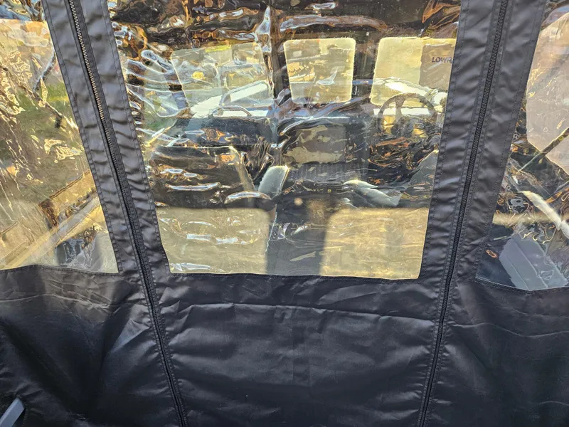 Slide: The Image of 2023 RH Boats 18 Sport interior view through clear protective cover. - 9