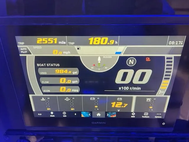 Slide: The Image of Garmin marine display on 2022 Sea Hunt Ultra 255 SE showing trip and boat status. - 10