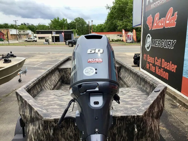 Slide: The Image of 2025 Reaper Boats 656 with Yamaha 60 engine, displayed at a dealership. - 4