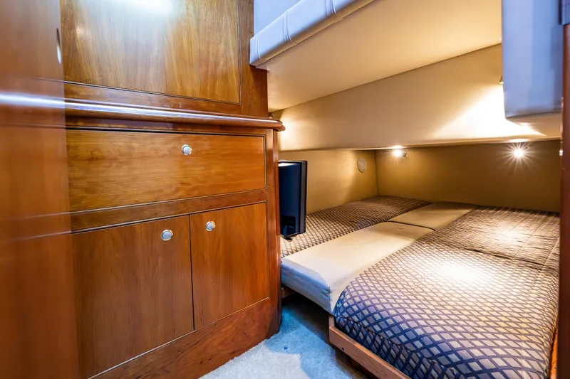 Slide: The Image of Luxurious cabin interior of 2004 Cruisers Yachts 455 Express Motoryacht with wood cabinetry. - 29