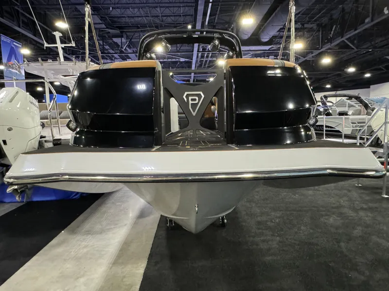 Slide: The Image of 2025 Paradigm Damascus 260 Surf boat displayed at an indoor exhibition. - 10