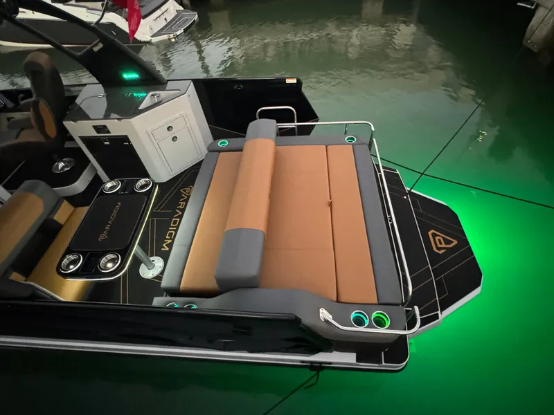 Slide: The Image of 2025 Paradigm Damascus 260 Surf boat with illuminated deck and luxurious seating. - 14