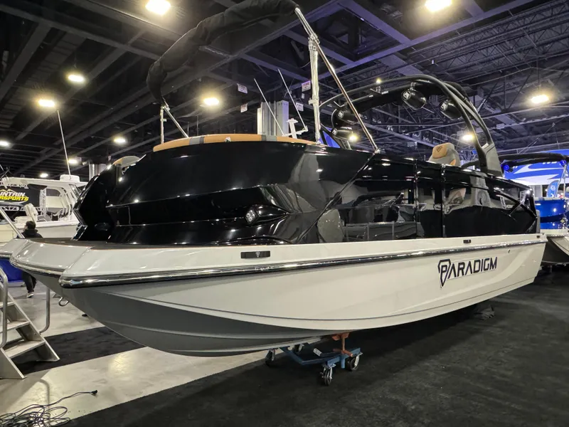 Slide: The Image of 2025 Paradigm Damascus 260 Surf boat displayed at an indoor exhibition. - 3