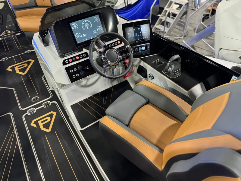 Slide: The Image of Modern Paradigm Damascus 260 Surf boat cockpit with advanced controls and luxurious seating, 2025 model. - 7