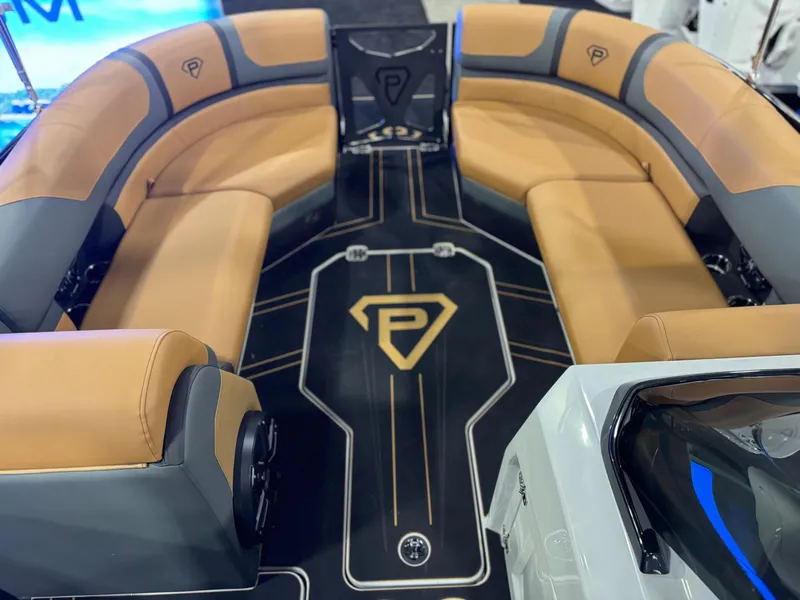 Slide: The Image of Luxurious interior of 2025 Paradigm Damascus 260 Surf boat with tan seating. - 8