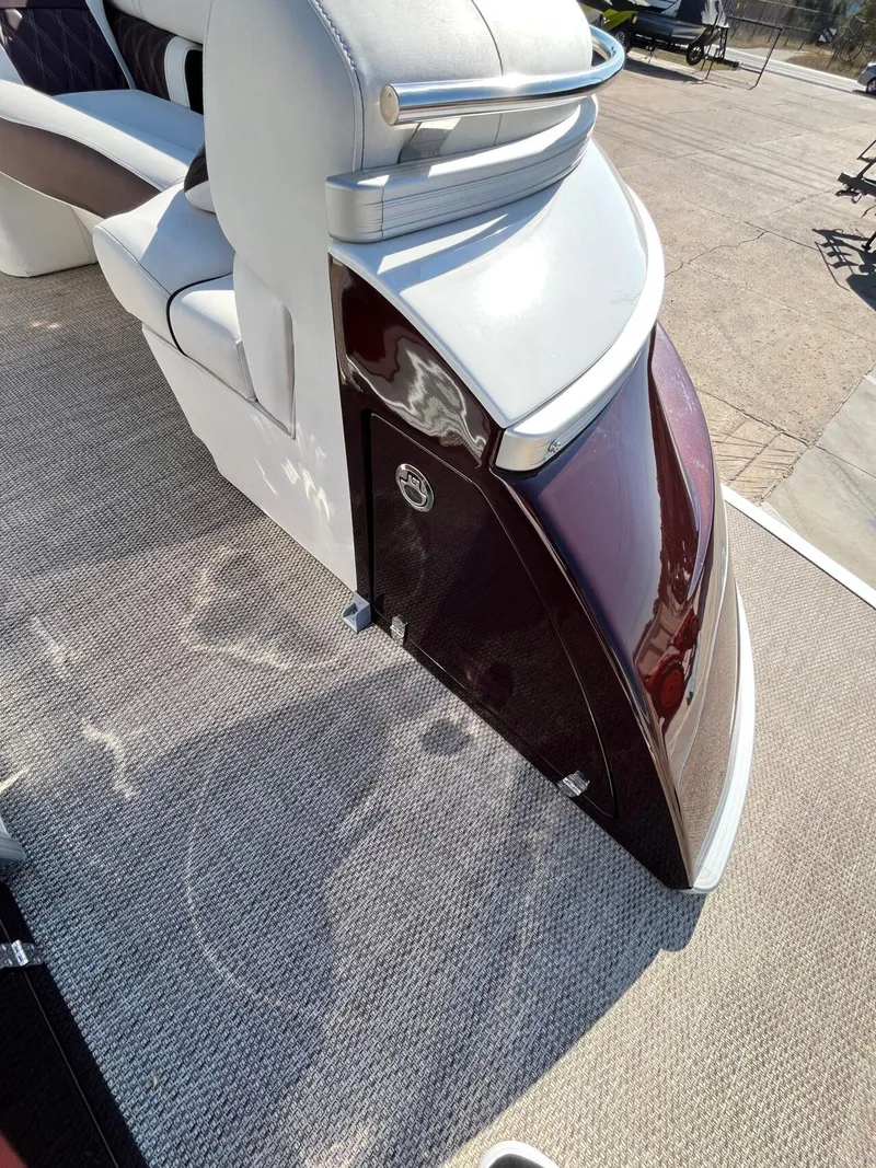 Slide: The Image of 2023 Bennington 23Q boat interior with luxurious seating and sleek design. - 10