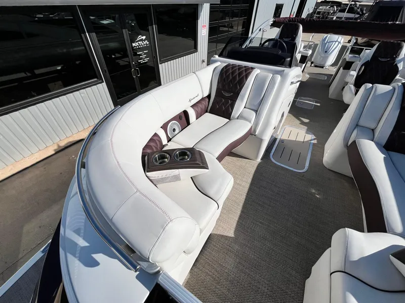 Slide: The Image of 2023 Bennington 23Q pontoon boat with luxurious seating and modern design. - 11