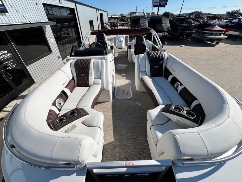 Slide: The Image of 2023 Bennington 23Q pontoon boat with luxurious seating and modern design. - 13