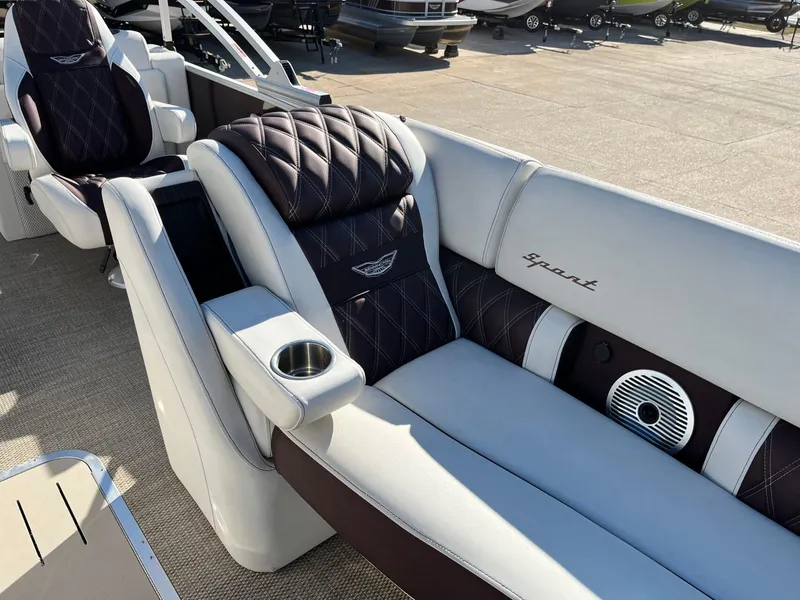 Slide: The Image of 2023 Bennington 23Q boat interior with luxurious seating and cup holder. - 15