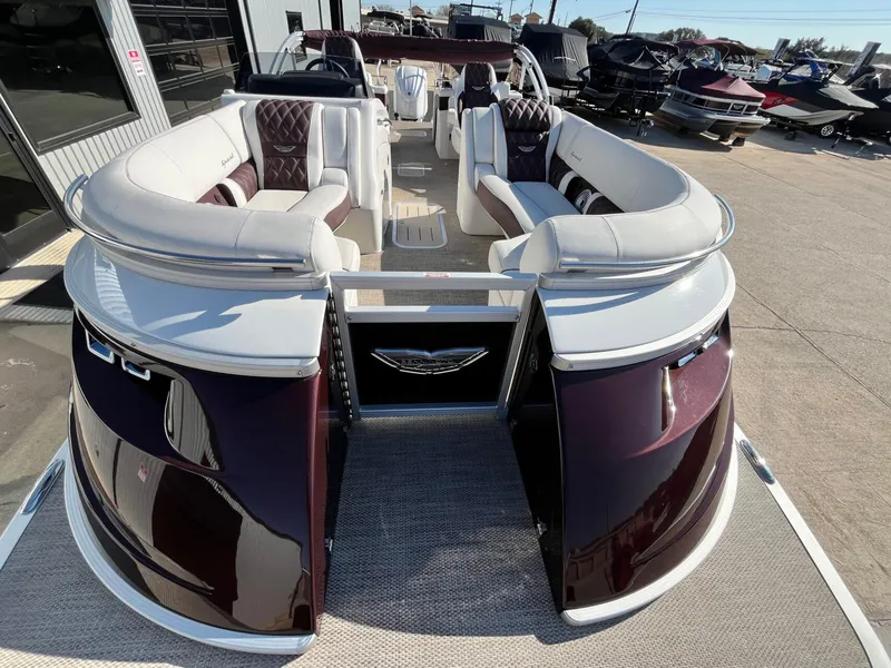 Slide: The Image of 2023 Bennington 23Q pontoon boat with luxurious seating and sleek design. - 8