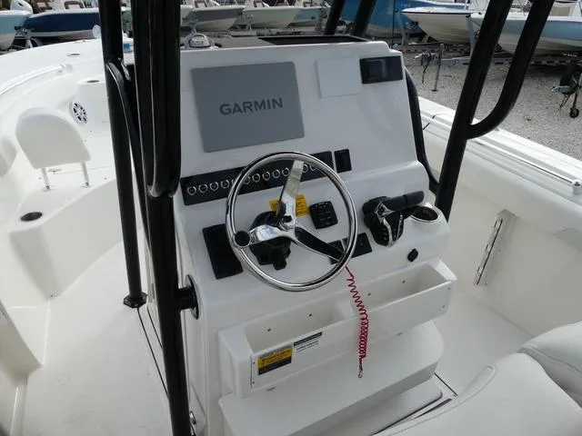 Slide: The Image of Key West 244 CC 2025 boat console with Garmin navigation system. - 12