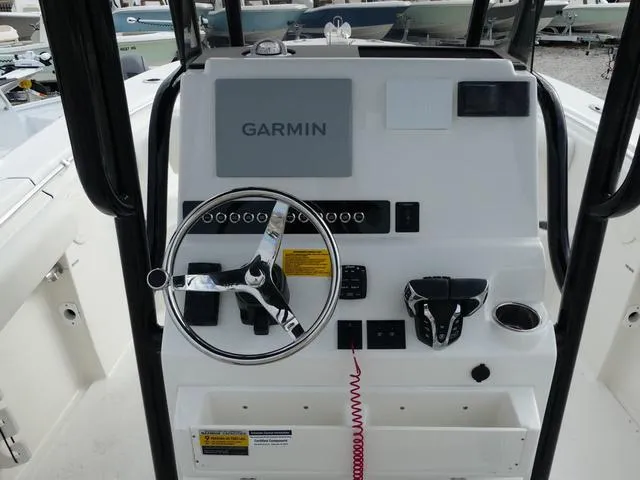 Slide: The Image of 2025 Key West 244 CC boat console with Garmin navigation system. - 13