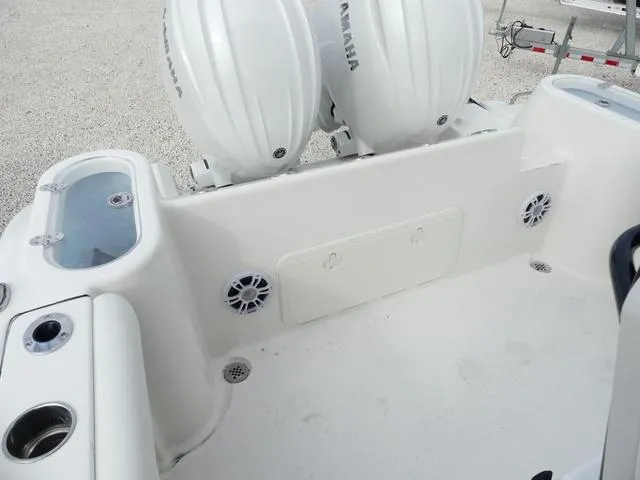 Slide: The Image of 2025 Key West 244 CC boat with dual Yamaha outboard motors and spacious deck. - 17