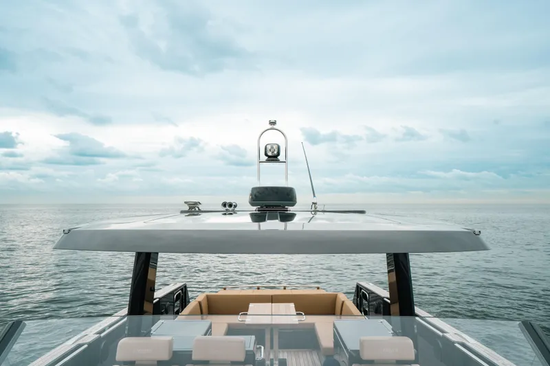 Slide: The Image of 2022 Fjord 52 Open yacht on calm sea under cloudy sky. - 11