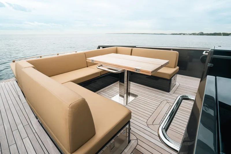 Slide: The Image of Luxurious seating area on 2022 Fjord 52 Open yacht with ocean view. - 16