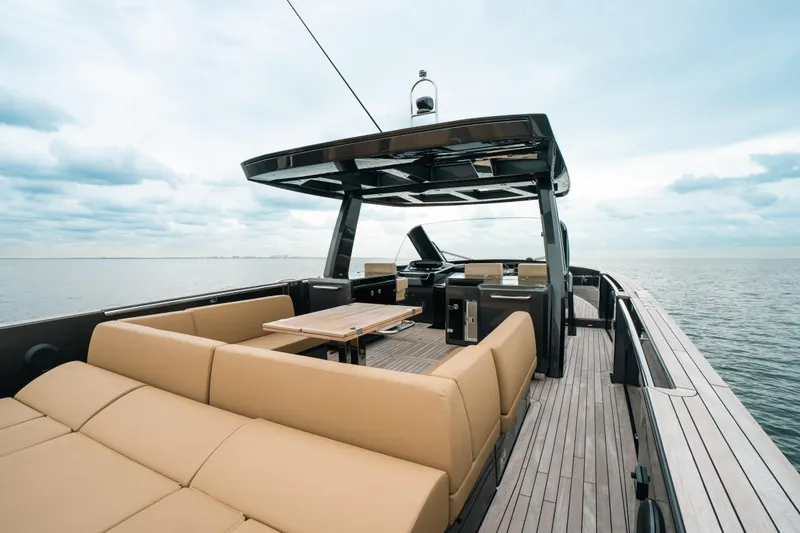 Slide: The Image of 2022 Fjord 52 Open yacht with spacious deck and luxurious seating on open water. - 26