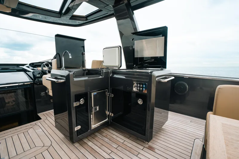 Slide: The Image of Luxurious 2022 Fjord 52 Open yacht interior with modern kitchen amenities. - 28
