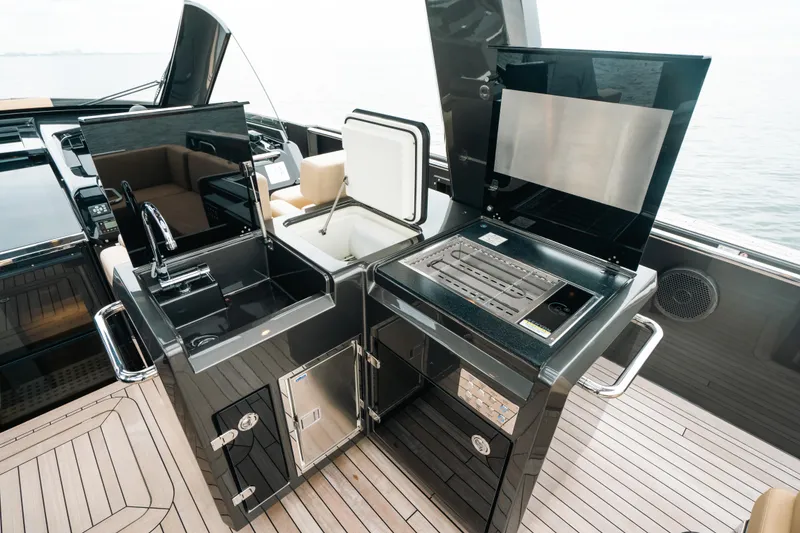 Slide: The Image of Luxury outdoor kitchen on 2022 Fjord 52 Open yacht with grill and sink. - 29
