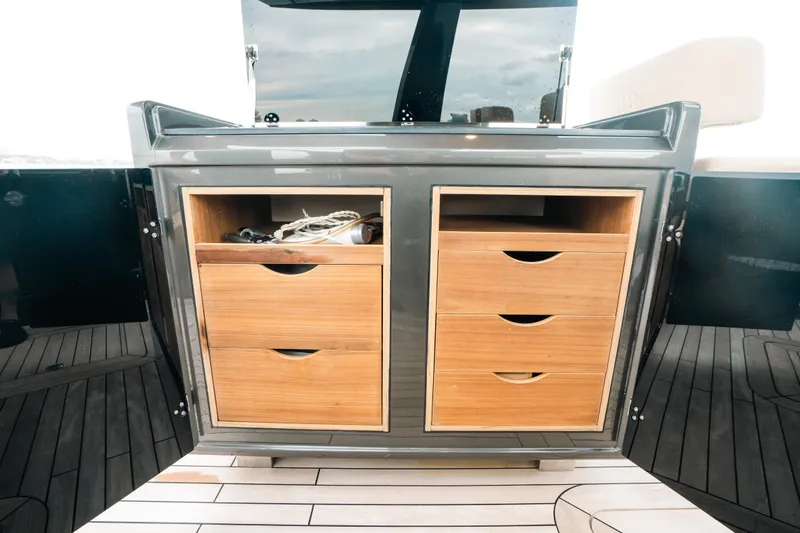 Slide: The Image of Cabinet with wooden drawers on 2022 Fjord 52 Open yacht deck. - 30