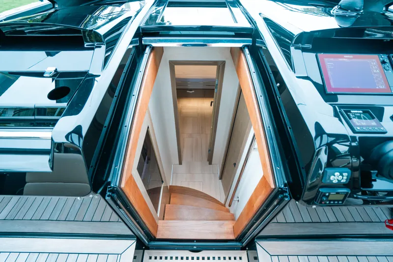 Slide: The Image of Interior view of 2022 Fjord 52 Open yacht, showcasing sleek design and modern staircase. - 31