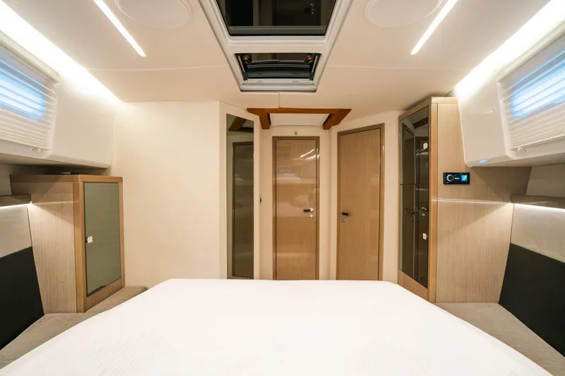 Slide: The Image of Luxurious interior of 2022 Fjord 52 Open yacht cabin with modern design and ambient lighting. - 35