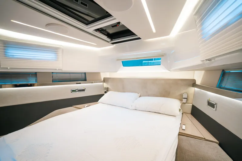 Slide: The Image of Luxurious bedroom interior of 2022 Fjord 52 Open yacht with modern design and ambient lighting. - 36