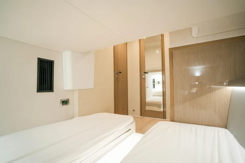 Slide: The Image of Interior cabin of 2022 Fjord 52 Open yacht with modern design and twin beds. - 41