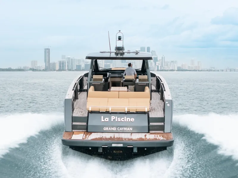 Slide: The Image of Fjord 52 Open yacht cruising near city skyline, 2022 model, Grand Cayman. - 48