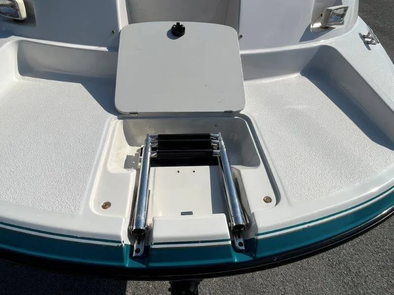 Slide: The Image of 1996 Chaparral Sunesta 250 boat swim platform with retractable ladder. - 37