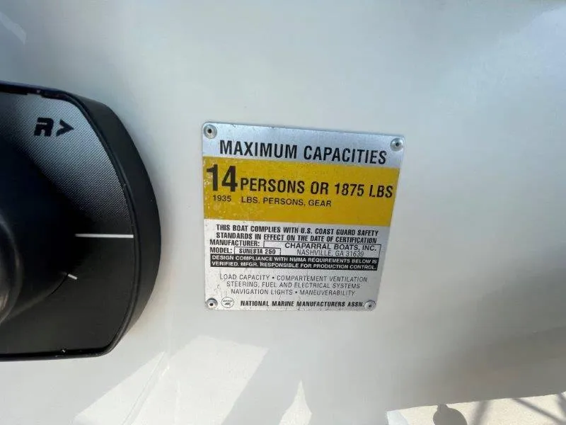 Slide: The Image of Capacity label on 1996 Chaparral Sunesta 250, max 14 persons or 1875 lbs. - 39
