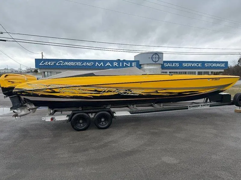 Slide: The Image of Spectre Catamaran 32 2013 - 14