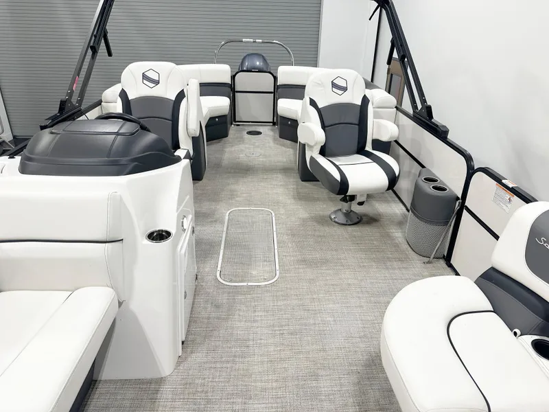 Slide: The Image of 2022 South Bay 222RS pontoon boat interior with plush seating and modern design. - 8