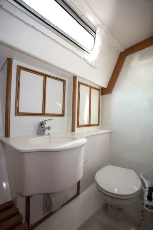 Slide: The Image of Modern bathroom in 2025 Rustler 37 yacht with sink and toilet. - 45