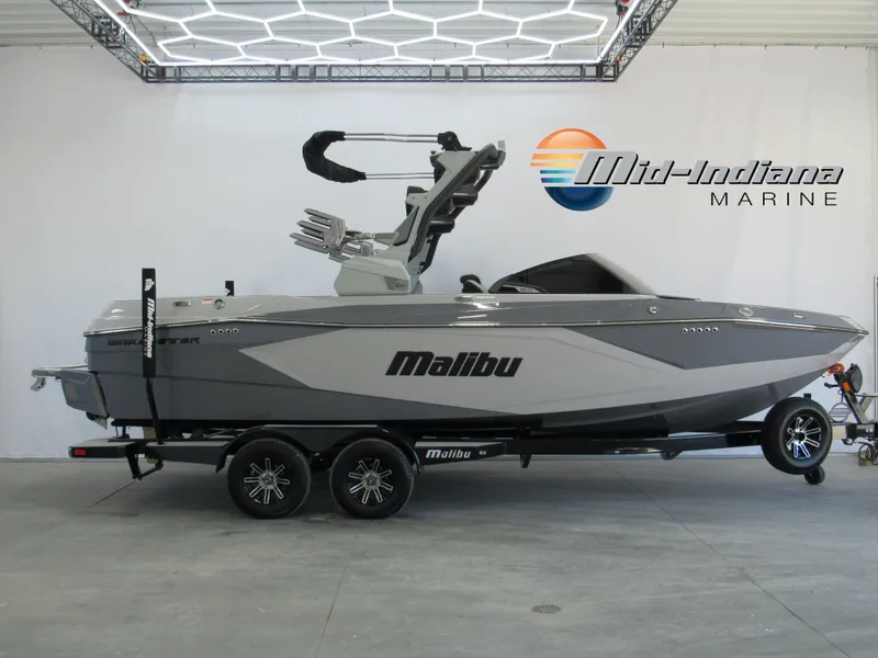 The Image of 2025 Malibu 23 LSV boat on trailer at Mid-Indiana Marine showroom. - 0