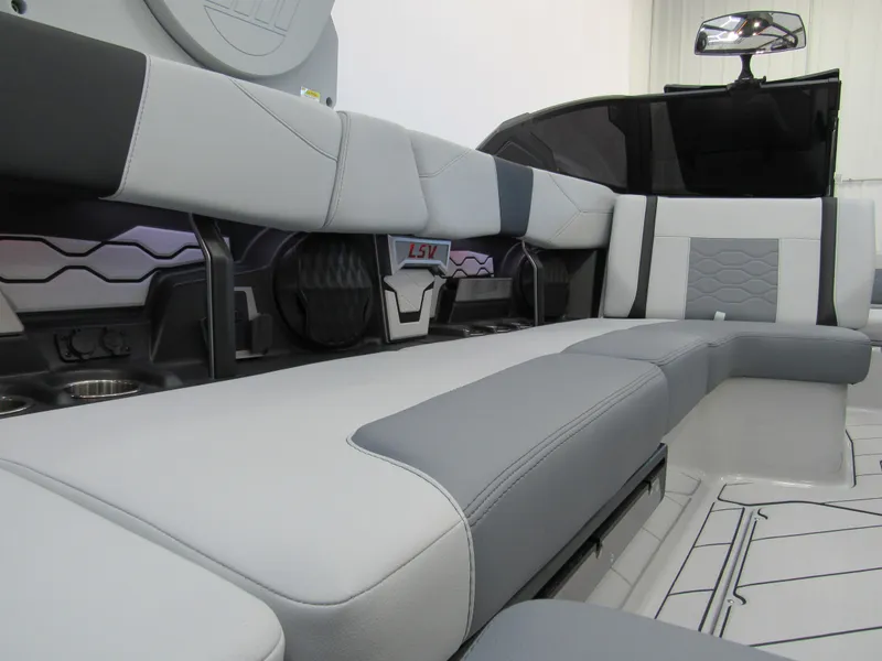 Slide: The Image of 2025 Malibu 23 LSV interior with sleek, modern seating and stylish design. - 8