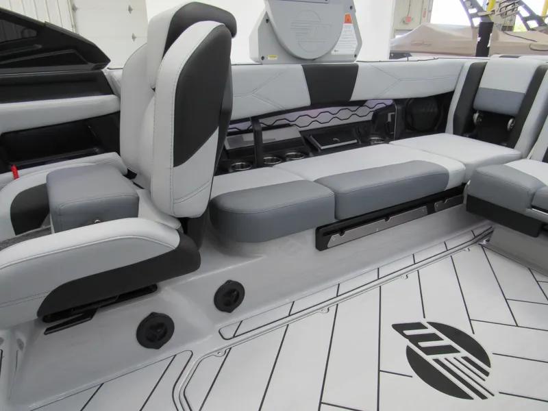 Slide: The Image of 2025 Malibu 23 LSV interior with sleek gray and white seating design. - 9
