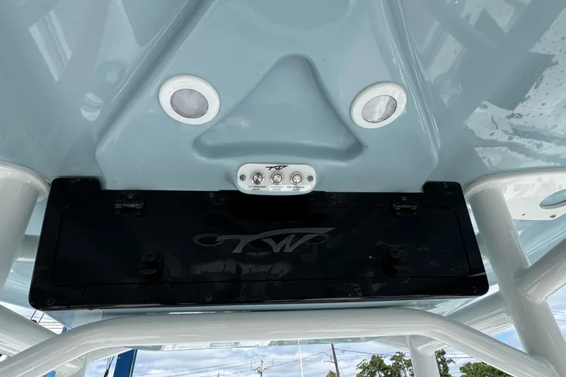 Slide: The Image of 2025 Tidewater 210 LXF boat console with speakers and control panel. - 9