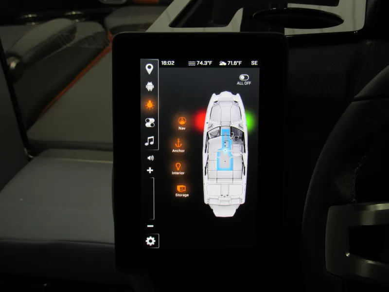 Slide: The Image of 2025 Malibu Wakesetter 22 MXZ touchscreen display showing boat controls and settings. - 15